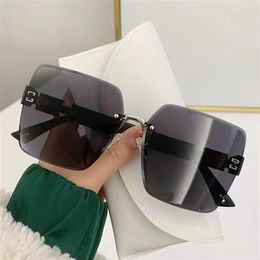 Brand Slim rimless cut edge Sunglasses Sunglasses Fashion UV protection large frame net red sunshade mirror UV400 big letter sunglasses designer.