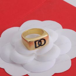 Sell like hot cakes Gold ring, Brass material black enamel Alphabet neutral designer ring, worn by both men and women, Valentine's Day, high quality gift. wholesale