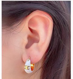 New Arc de Triomphe earring white enamel earrings for girls European and American design retro Water drop earrings for social gifts