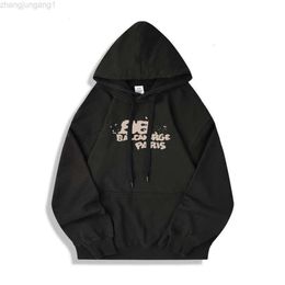 24SS Designer Balanciaga Hoodie Balencaigaity New Paris World Inkjet Graffiti Pure Original Light Luxury OS Loose Speckle Advanced Light Luxury Couple Sweater