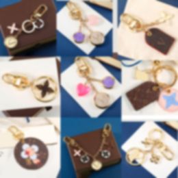 2023Handmade designer keychains dragonne multicolor key chain women men brown leather bag wallet lanyard plated gold accessories dragonne keychain letter C12