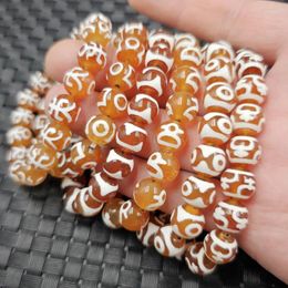 Strand -like Red Agate Three Eyes Tibet Beads Bracelet 10mm