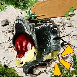 Kindersimulation drückt Dinosaurier-Ankunftsspielzeug-Drachen brüllender Kopf und schüttelt links und rechts Tyrannosaurus Rex-Dekompressionstrick.