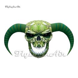 Horrible Hanging Green Giant Inflatable Skull Suspended Devil Head With Horns For Carnival Stage Decoration