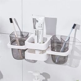 Toothbrush Holders Mouthwash Cup Bathroom Non-perforated Foldable No Mark Adhesive Wall-mounted Bathroom Shower Shelf Toothbrush Holder Creative 231025