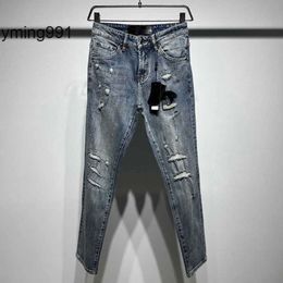women 23 new jeans washe rippe holes flockin letters enim trousers men micro-elastic slacks esiner pants treny thin Jeans