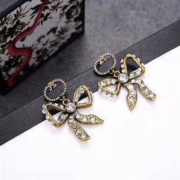 2021 new fashion Charm bow earrings ladies retro old style308C