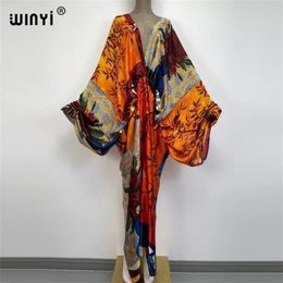 Sexy bech high-quality hand-rolled feel silk rayon fashion print WINYI Maxi women's robes long beach V-neck Bohemian dress 22258t