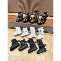 Nylon gabardine apres fluff ski boots bag Black 1U007N Upper with drawstring Removable padded pile lining Enameled metal triangle logo booties rubber sole designer