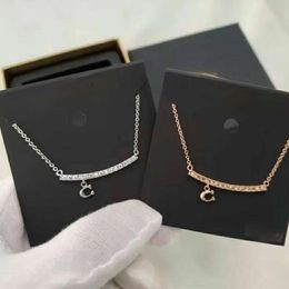 COA Kous minority jewelry smiley face C-shaped pendant crystal clavicle chain for girlfriends commemorative gift.
