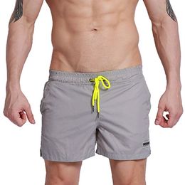 Whole-Fashion Mens Board Shorts DESMIIT Good Quality Bermuda Surf Trunk Beach Swimwear Swimming Suit Man GYM Sport Running Car2101