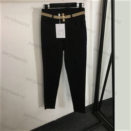 Jeans Frauenbrief Ribbon Spleißdesign dünne lässige neun Punkte Jeans schwarze Fußhose