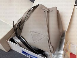 Luxury 1BE060 Bucket Bag High Capacity Women Backpack Leather Body Contrast Shoulder Strap Metal Sequin Letter Designer Bag