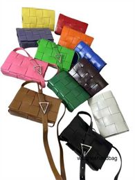Designer handbag with logo Postman Bag Geometric Chequered Versatile Woven Fashion Brand Oil Wax Leather Diagonal Back Single Bag Bucket Crossbody