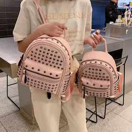 Ins super hot rivet small backpack female 2024 new designer student mini schoolbag pu leather leisure Purses Outlet
