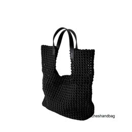Designer handbag with logo Summer Fashion This Year Popular High Quality and Small Group Temperament Handheld Hollow out Woven Tote Bag