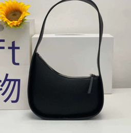The Row Half Moon Bag In Smooth Leather Women Designer With Flat Shoulder Strap And Curved Zipper Closure Clutch Tote Sudeds Premium touch Fashion trend