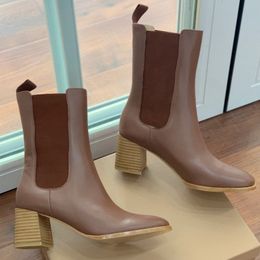 Autumn and winter classic comfortable and elastic Chelsea cowhide high-quality thick heel round toe boots.