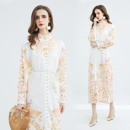 Abito lungo bianco da donna con stampa elegante Abito lungo con maniche a lanterna di design Colletto alla coreana Cintura sottile Abiti da vacanza con lacci 2023 Autunno Inverno Chic Runway Slim Abiti da festa