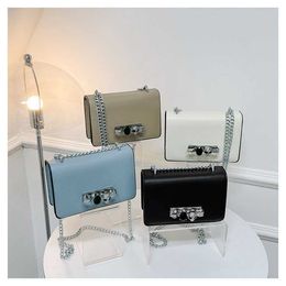 Lock buckle PU small square bag popular this year one shoulder crossbody 2023 new women's commuting chain Purses Outlet