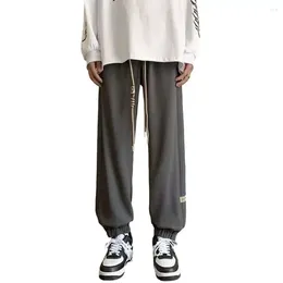 Men's Pants Mid-rise Elastic Waistband Men Sweatpants Drawstring Waffle Texture Pockets Retro Solid Color Casual Jogging Trousers Streetwear