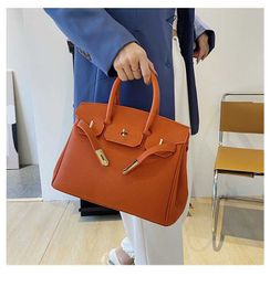 Bags Store Outlet 2024 Summer New Handbag Solid Synthetic Leather Lock Buckle Large Capacity Shopping Bag Korean Version