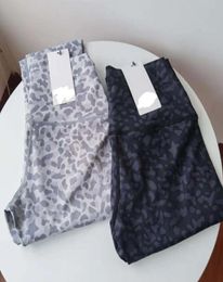 outfitshaping Peach hip leopard print high waist eightpoint leggings elastic sports fitness running yoga pants lub9301096