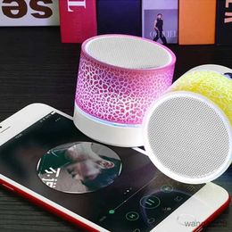 Mini Speakers Portable Mini Wireless Bluetooth Speaker with Built-in Mic Handsfree Card Dazzling Crack Colourful LED Bluetooth HD Sound