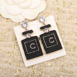 2023 Luxury quality Charm drop earring bottle shape and black color sparkly diamond in 18k gold plated have stamp box PS4767A