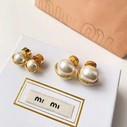 miumius earrings Miss Miao half pearl earrings half round metal light luxurious versatile inset earrings small fragrant wind earrings female