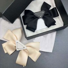 Brand Bowknot Hairpin Simple Fashion Girl Cute Lolita Style White Black Large Bowknots Spring Clips Ladies Elegant Top Clip Hair Accessories