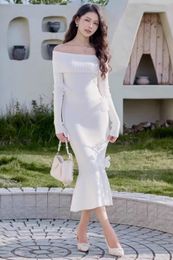 Urban Sexy Dresses Knitted sweater autumn and winter new French off shoulder fishtail knit dress slim fit wrap buttocks white top T-shirt