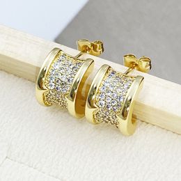 Delicado circón lindos pendientes de sementales Corea Color de oro Pierdades de oreja de aro pequeño para mujeres Joyas de moda S200