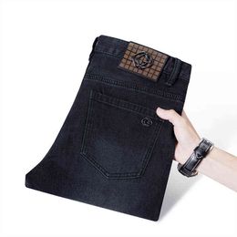 Autumn Men's Gouoi Jeans and Winter Style Korean Fashion Elastic Slim Fit Small Feet High-end Brand Casual PantsR2DX