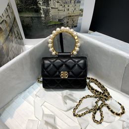 Totes bags Designer Black Pearl Handle Clutch Black and gold Colour big portable oneshoulder crossbody CM 2022