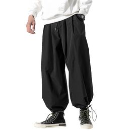 Calça masculina design de cordão de cordão harém homem folggging jogging estilo japonês groth masculino perna larga casual calças soltas 220906
