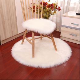 Carpets Soft Small Artificial Sheepskin Rug Chair Cover Bedroom Mat Wool Warm Hairy Carpet Seat Washable 15 Colours 220906