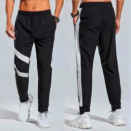 Lu Lu Newest Man NWT Loose and Breathable Running Fiess Yoga Pants Men s Hip Up Splicing Sports Quick Drying Lu Pant Basketbl wv Sport Baketb