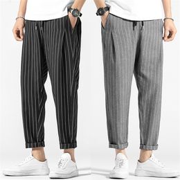 Men's Pants Japanese Retro Casual Pants Men Streetwear Loose Drawstring Wild Fashion stripe Plaid Pants Male 220907