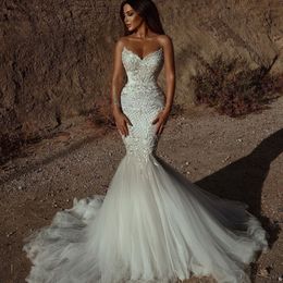 Abiti da sposa sirena in pizzo 2024 tulle in pizzo Applique Cristalli di perline di perline Off di abiti da sposa sposa con perline fatte a mano più dimensioni sexy sirena abito mercola