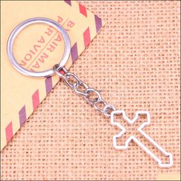 Key Rings 20Pcs New Fashion Keychain 38X22 Mm Hollow Cross Pendants Diy Men Jewelry Car Key Chain Ring Holder Souvenir For Gift Drop Dhxop