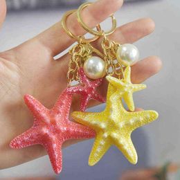 Keychains Cute Aquarium Commemorative Small Gift Pendant Creative Pearl Starfish Keychain Couple Bag Ornaments Car Keyring Jewellery T220909