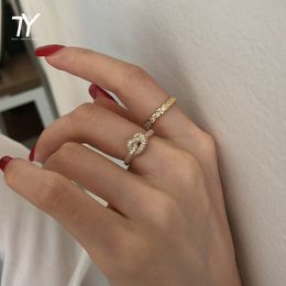 2020 New Creative Zircon Metal Knot Twist Design Rings For Woman Fashion Gold Colour Jewellery Wedding Party Girl's Unusual Ring