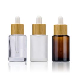 Flat Shoulder Glass Essential Oil Perfume Bottles Transparent Amber Frosted 30ml 1oz Eye Dropper Bottle with Bamboo Cap SN4140