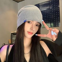 2022 new Ins street solid Colour Baotou small blue label couple pile pile hat net red with the same style hip-hop cold hats wholesale and retail