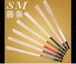 Sp torture tool spank tool tuning ring ruler sm sex toys pointer beat small leather whip wood 8 strands of rattan brown and black diameter 0.6cm