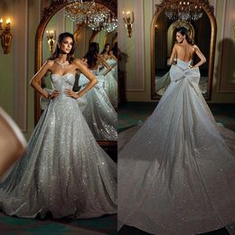 Atemberaubende glänzende ärmellose Hochzeitskleid Eine Linie Schatz Bow Brautkleider glamouröser Perlengewand von Mariee