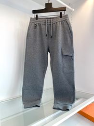 2022 autunno e inverno pantaloni firmati tasche alla moda giuntura pantaloni da jogging di lusso pantaloni cargo comodi pantaloni da uomo in materiale superiore