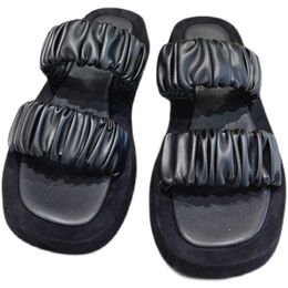 The Row slipper Designer Dress Shoes shoes the with thick sole and outer slipper flat type of high rise sheepskin sandal