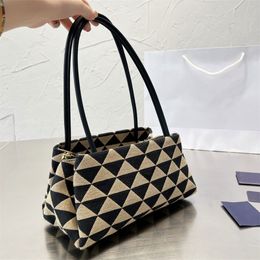 New small embroidered fabric handbag Special bag leather handle triangle badge multi-pocket French Sacoche designer luxury trend large capacity handbag